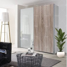 Wiemann Bern of width 150 cm sliding door wardrobe without cornice, with handles in silver/slate Wiemann Bern of width 150 cm sliding door wardrobe without cornice, with handles in silver/slate