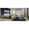 Wiemann Serena Plus 300 cm 6 Door 3 Drawer Left and Right Bi-Fold Panorama Wardrobe with Champagne Glass Front